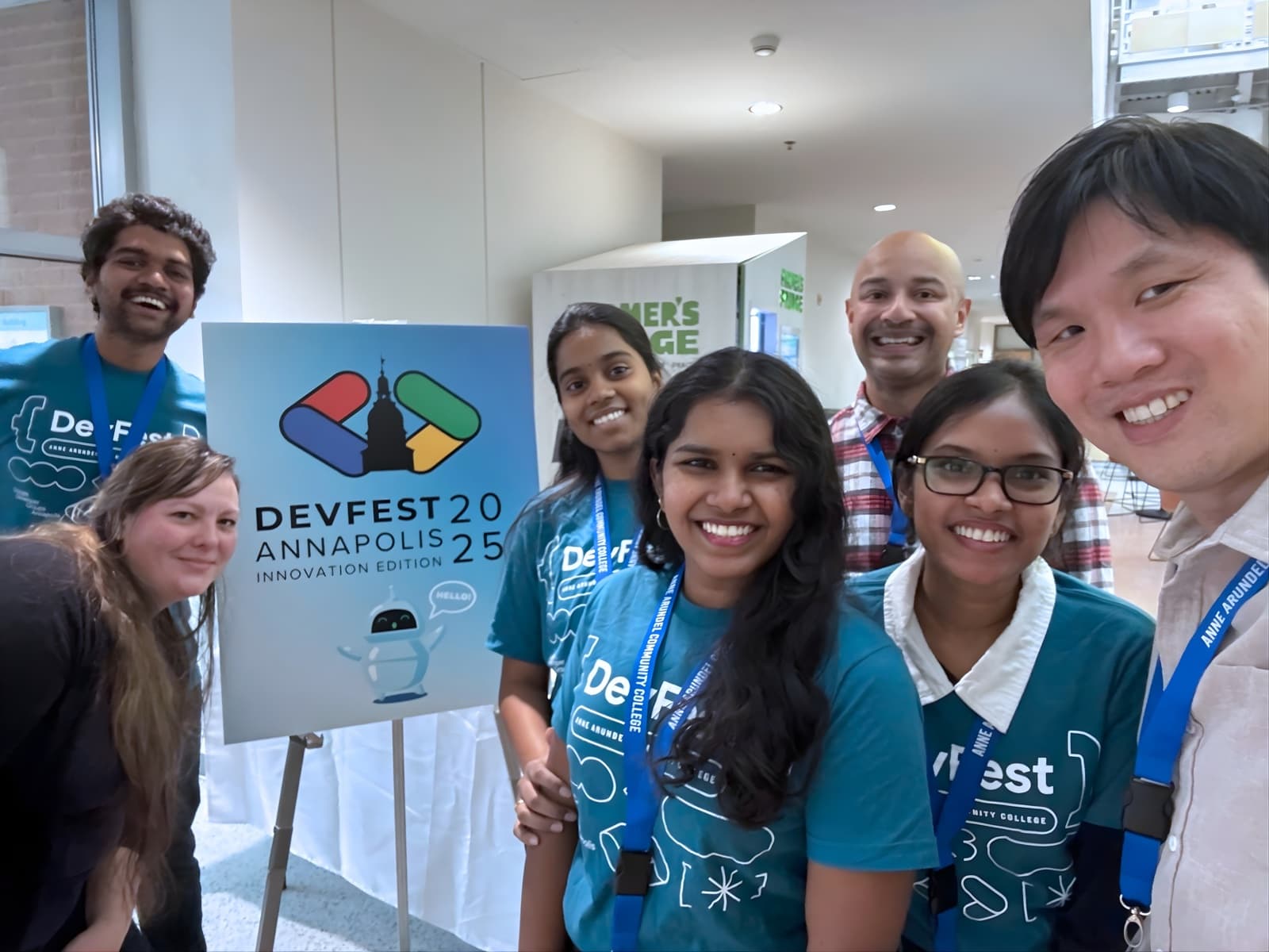 DevFest volunteers at the welcome desk