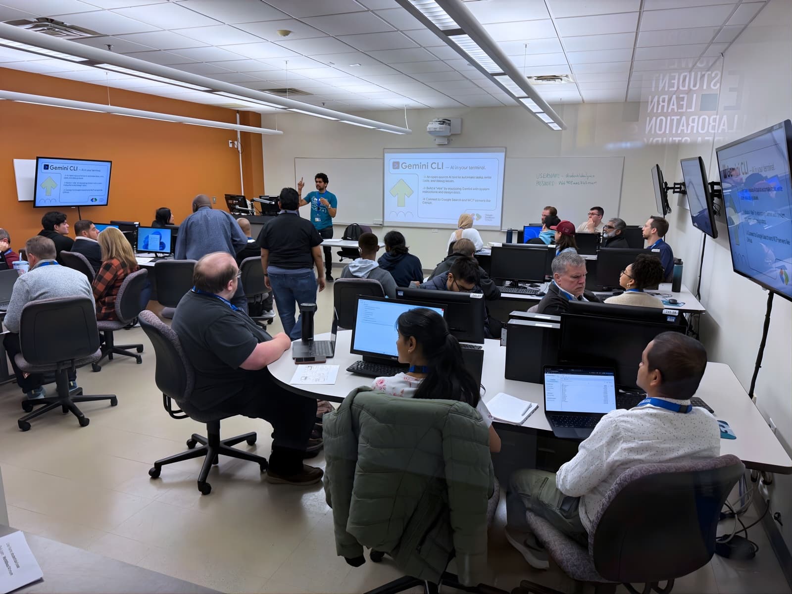 DevFest attendees at the Gemini CLI coding lab